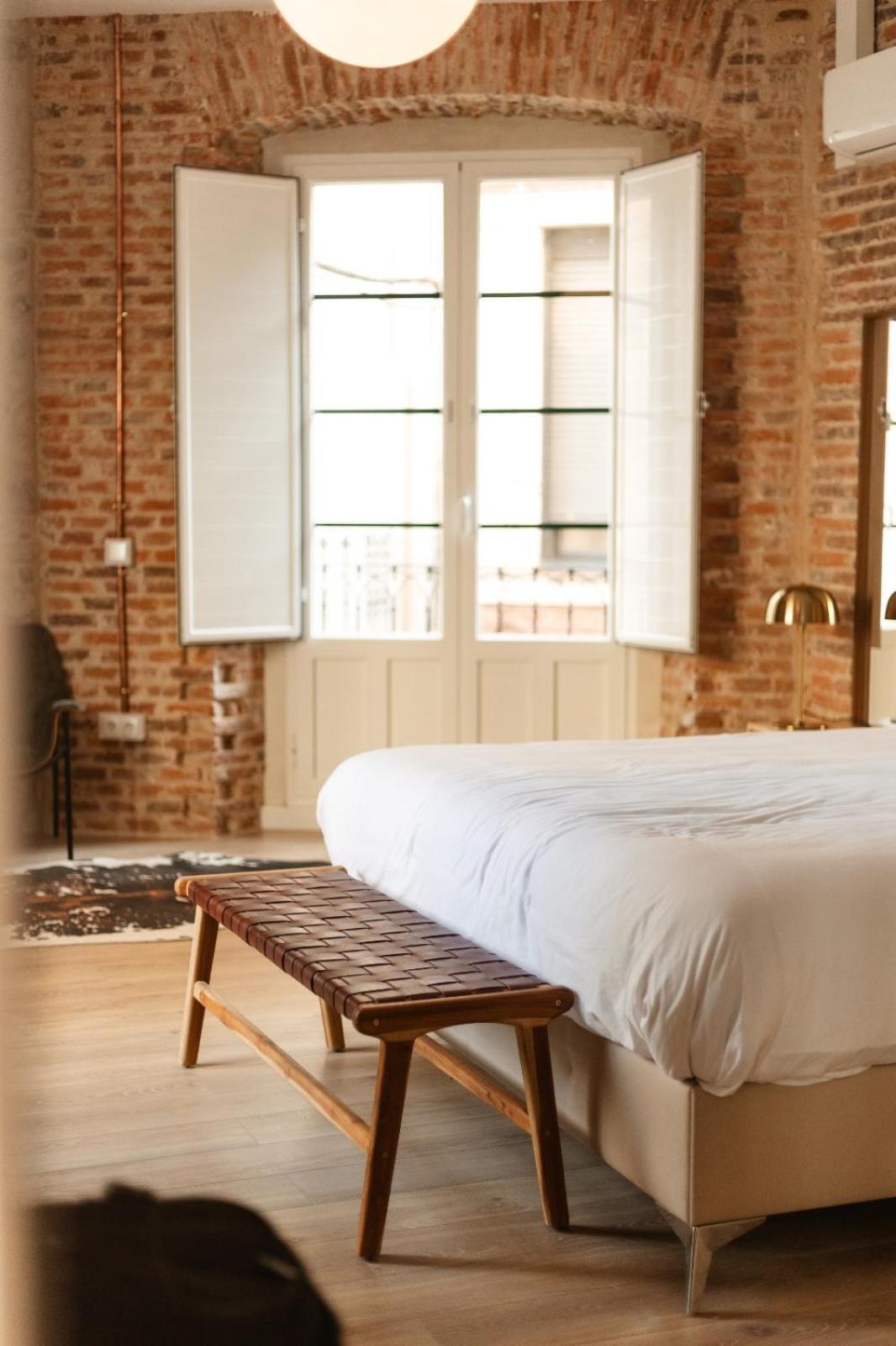 فندق Albany Ancha ليون المظهر الخارجي الصورة A bedroom at Hotel 927