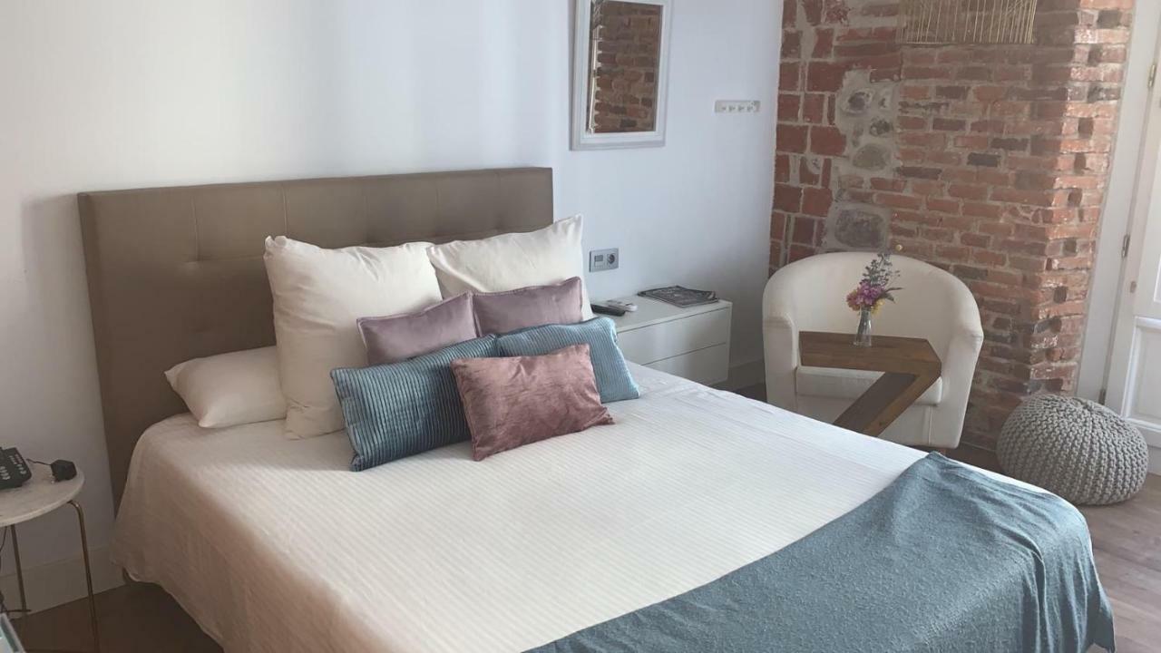 فندق Albany Ancha ليون المظهر الخارجي الصورة A bedroom at the hotel